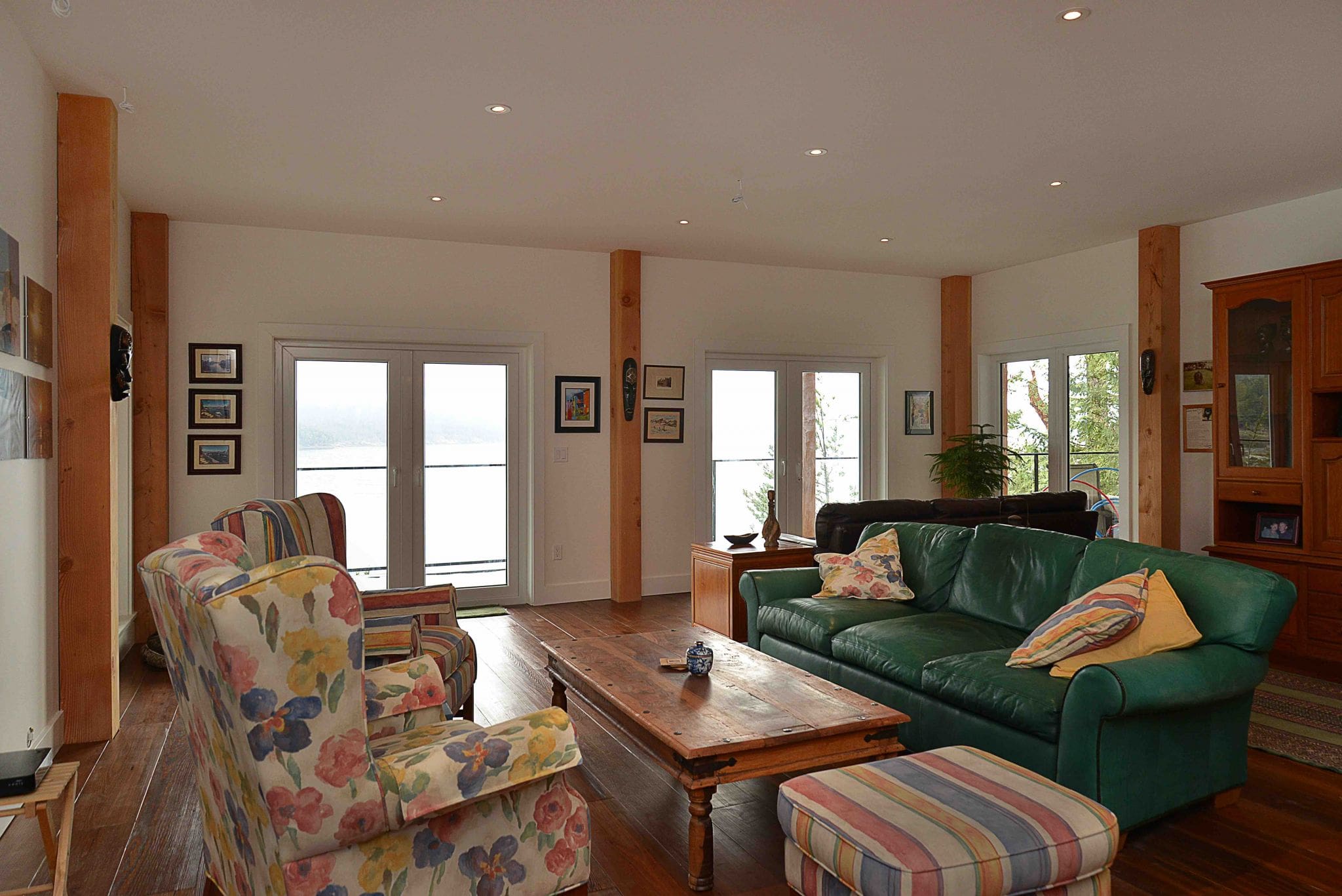 Pender Harbour Timber Frame Home | Streamline Design Ltd Rec room with outdated furniture