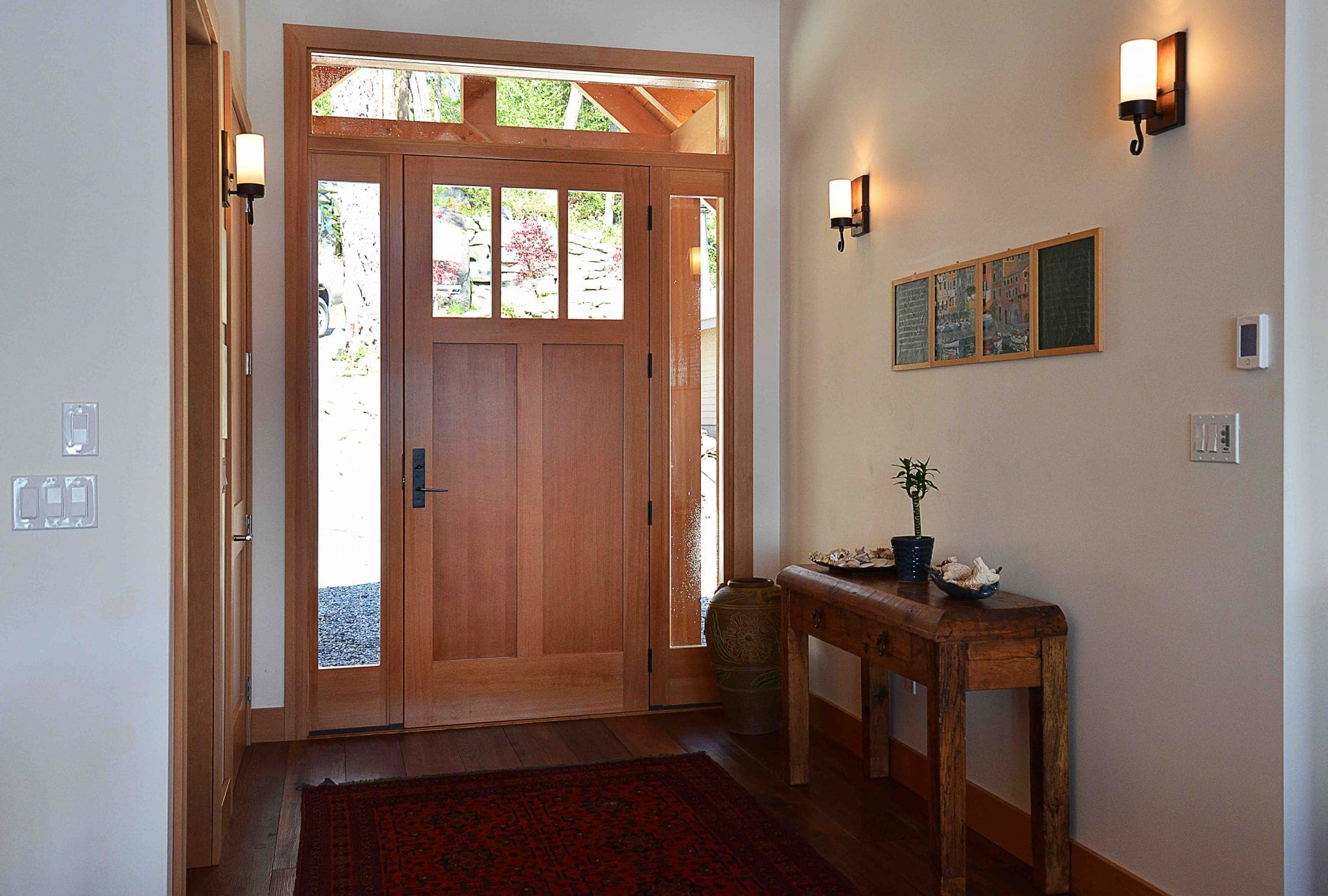 Pender Harbour Timber Frame Home | Streamline Design Ltd The inside of the front door in a new home