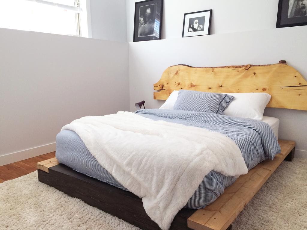 Timber Wolf Bed and Breakfast Timber Frame Design 10 | Streamline Design Ltd Main bedroom in basement suite